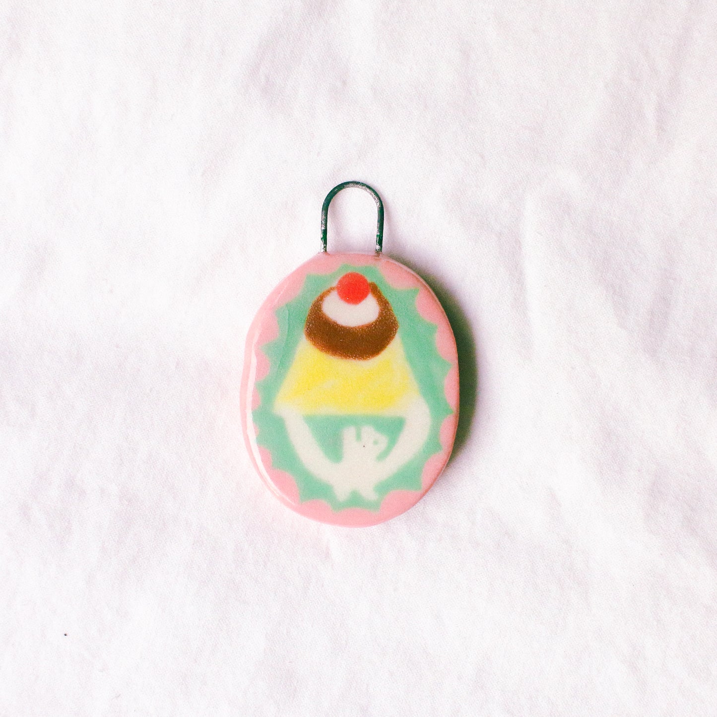 'Holding the Big Pudding' Handmade Ceramic Hair Clip (B-grade: Crazing, Pendant Only)