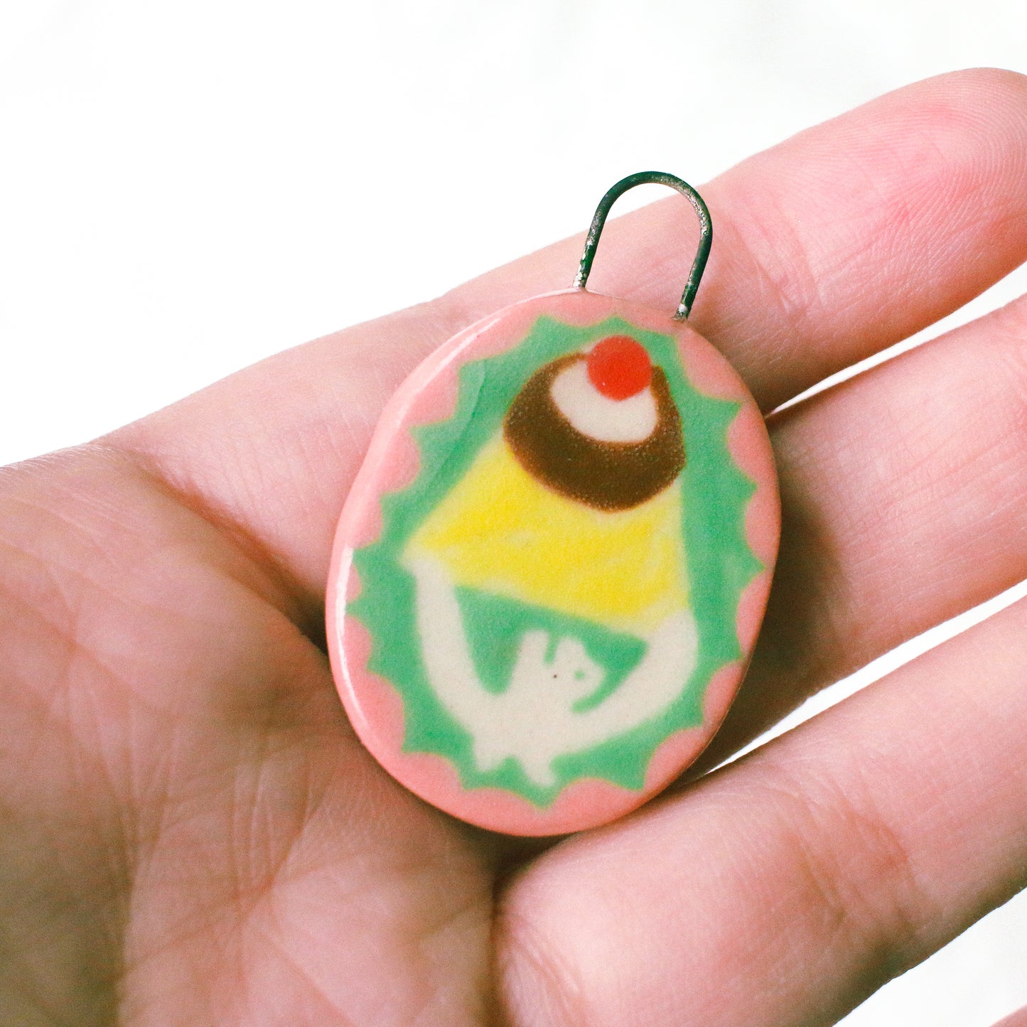 'Holding the Big Pudding' Handmade Ceramic Hair Clip (B-grade: Crazing, Pendant Only)
